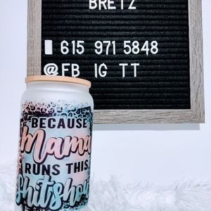 Mama runs this Glass tumbler